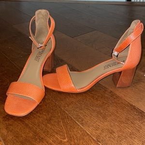 Never worn. Orange leather sandals